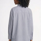Elegante gestreepte damesblouse met volant en lange mouwen