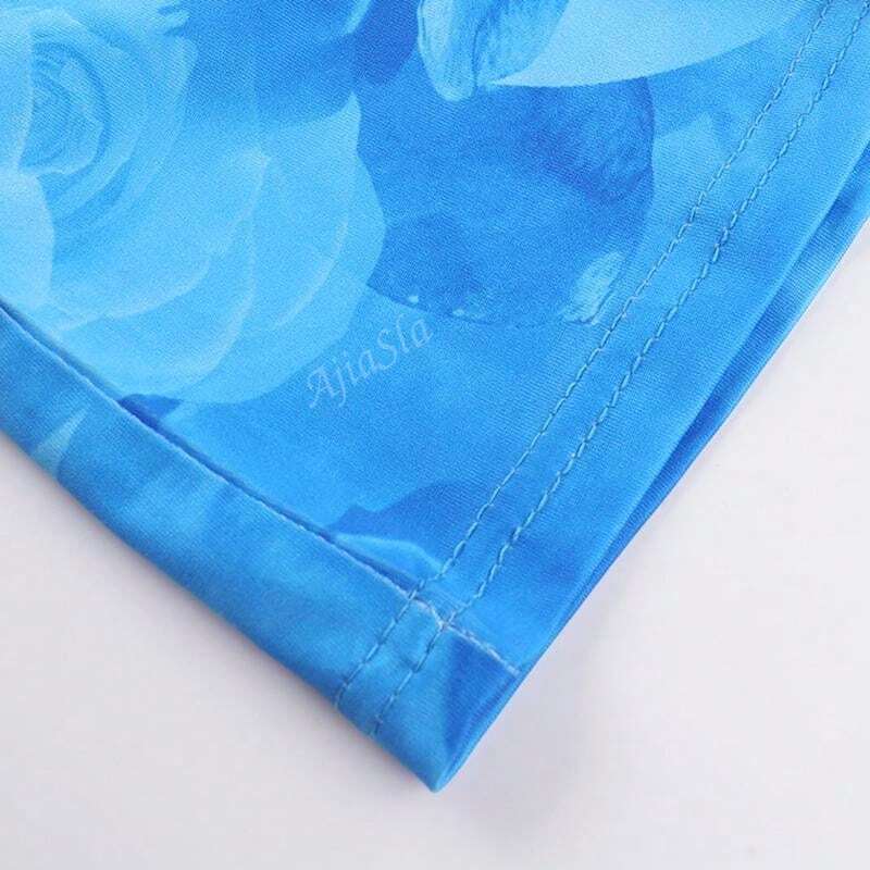 Lang zomerjurk met aquarelprint en spaghettibandjes