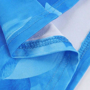 Lang zomerjurk met aquarelprint en spaghettibandjes