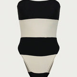 Schouderloze jumpsuit met contraststrepen & hoge beenuitsnijding