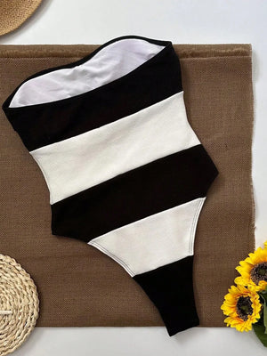 Schouderloze jumpsuit met contraststrepen & hoge beenuitsnijding