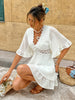 Witte Boho-zomerjurk met kant en volant – V-hals & losse pasvorm | Zendoo
