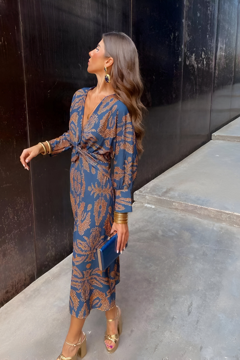 Elegante midi-jurk met twist-detail en bloemmotief – Tijdloos en stijlvol