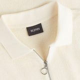 Moderne gebreide polo met rits