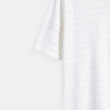 Witte gebreide poloshirt met structuurpatroon