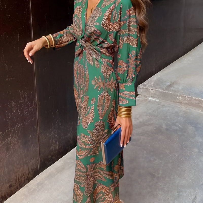 Elegante midi-jurk met twist-detail en bloemenpatroon – Tijdloos en stijlvol