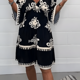Elegante jurk met patroon en V-hals – perfect voor elke gelegenheid