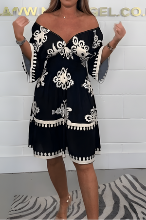 Elegante jurk met patroon en V-hals – perfect voor elke gelegenheid