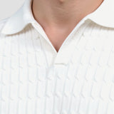 Witte gebreide poloshirt met structuurpatroon