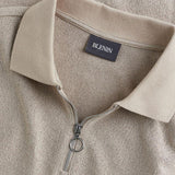 Moderne gebreide polo met rits