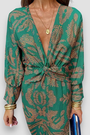 Elegante midi-jurk met twist-detail en bloemmotief – Tijdloos en stijlvol