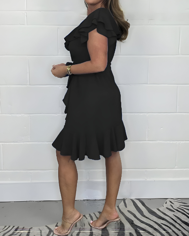 Elegante ruchesjurk met V-hals – vrouwelijke look voor elke gelegenheid