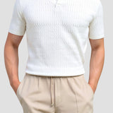 Witte gebreide poloshirt met structuurpatroon