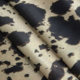 Erna | Vloeiende Midirok van Satijn met Hoge Taille en Opvallend Koeienvachtpatroon