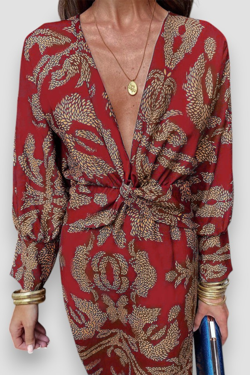 Elegante midi-jurk met twist-detail en bloemmotief – Tijdloos en stijlvol