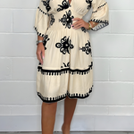 Elegante jurk met patroon en V-hals – perfect voor elke gelegenheid