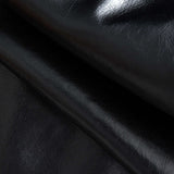 Nerine | Contrasterende kunstleren skaterrok met uitlopende stofinzetten en hoge taille