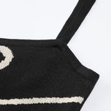 Maisie | Figuuraccentuerende midijurk met abstract patroon en delicate spaghettibandjes