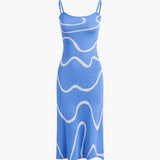 Maisie | Figuuraccentuerende midijurk met abstract patroon en delicate spaghettibandjes