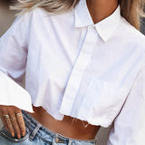 Geknipte Damesblouse met Raw Cut – Modern, Urban & Statementsterk