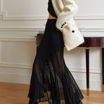 Annerose | Elegante plissé midi rok van transparant chiffon met ondoorzichtige onderrok