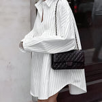 Witte oversized shirtjurk met strepen – Streetstyle-look