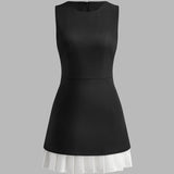 Robin | Elegante mouwloze midikleed met plissé-design