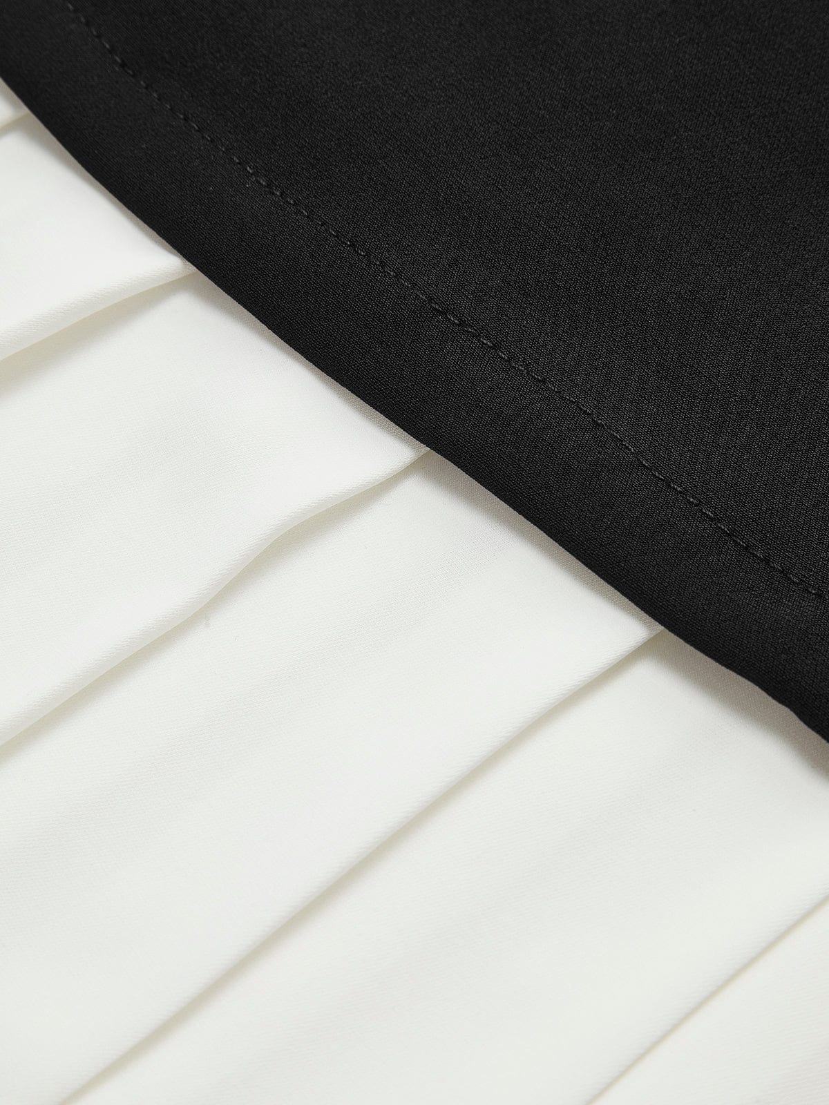 Robin | Elegante mouwloze midikleed met plissé-design