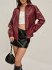 Bordeauxrode Kunstlederjacke
