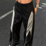 Viola | Joggingbroek met wijde pijpen en gedurfde zijstreep-detail