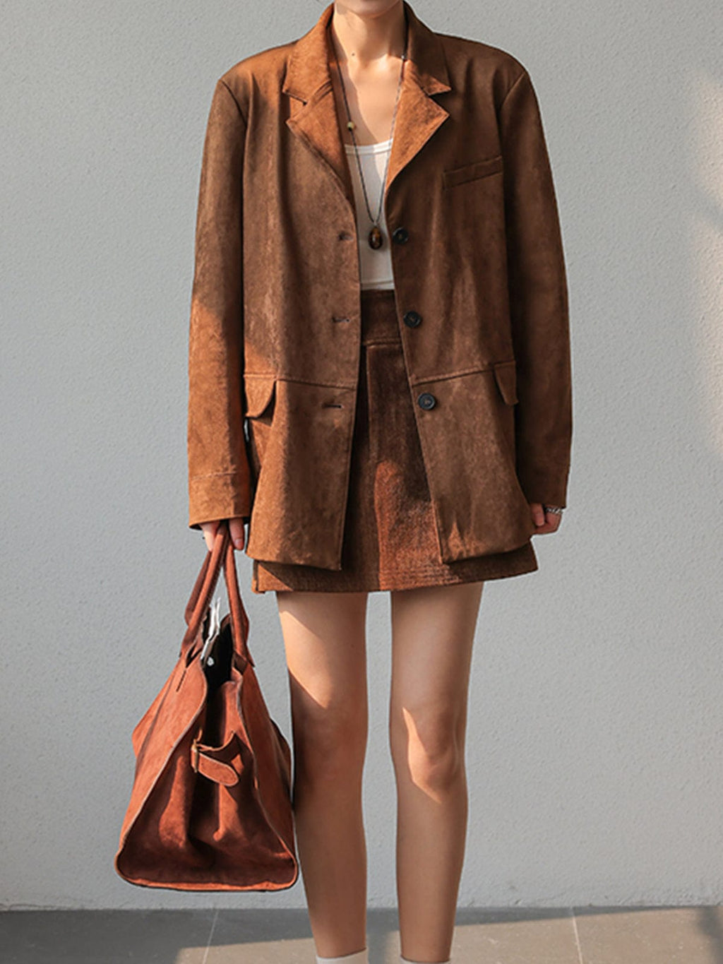 Romy | Trendy oversized blazer en rok set van bruin suede