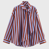 Elegante gestreepte damesblouse met strik en lange mouwen