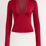 Elegante Top met Kant V Hals en Lange Mouwen