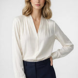 Elegante damesblouse met overslag en lange mouwen