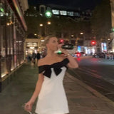 Eloise | Witte Minidress met Zwarte Strik & Carmen-Uitsnijding