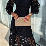 Elegante kantjurk met hoge kraag en transparante details