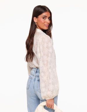 Elegante transparante blouse met bloemenpatroon – Crème