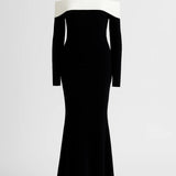 Elegante off shoulder lange avondjurk met contrast halslijn