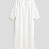 Minimalistische Maxi Jurk met Losse Pasvorm en Lange Mouwen