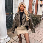 Jenne | Oversized Cropped Bikerjacke van Kunstleer met Riem
