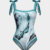 Angela | Twee-delig badpak set met abstracte print, strikbanden en pareo