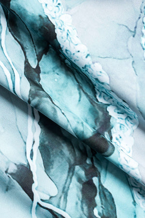 Angela | Twee-delig badpak set met abstracte print, strikbanden en pareo