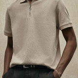 Moderne gebreide polo met rits
