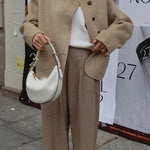 Courtney | Oversized Woljack met asymmetrische knoopsluiting en grote zakken