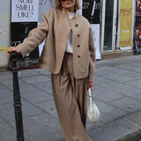 Courtney | Oversized Woljack met asymmetrische knoopsluiting en grote zakken