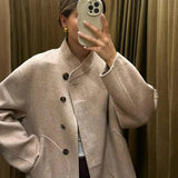 Courtney | Oversized Woljack met asymmetrische knoopsluiting en grote zakken