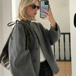 Courtney | Oversized Woljack met asymmetrische knoopsluiting en grote zakken