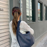 Charlyne | Grote gevlochten Hobo-tas