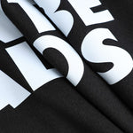 Braelyn | Zwart Korte Mouwen Cropped T-Shirt met "Wees Niet Jalours"-Print