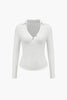 Dominique | Figurbetont Poloshirt met diepe V-hals en elegante knoopdetails